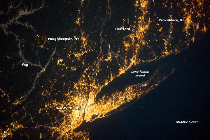 aerial night view of the lights of the NY Metro Region