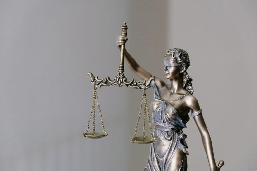 figurine of the scales of justice